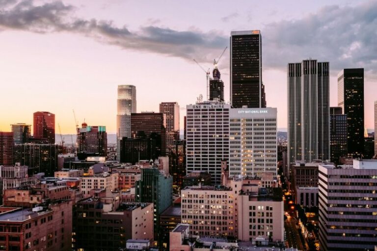 Urban - aerial photo of buildings during dusk