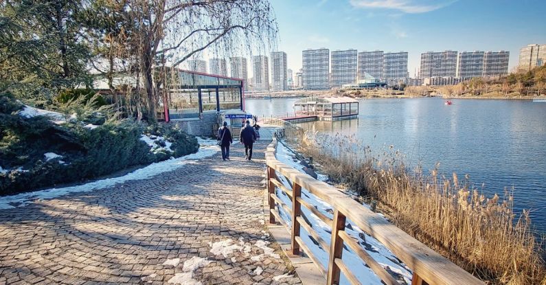 Park City - A walkway near a lake with snow on the ground