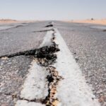 Earthquake - a crack in the middle of a road in the middle of nowhere