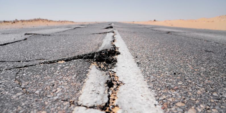 Earthquake - a crack in the middle of a road in the middle of nowhere