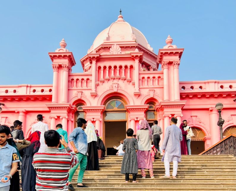 Architectural Heritage - a group of people walking up a flight of stairs