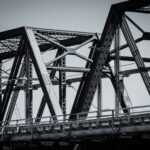 Bridge Construction - gray metal bridge under blue sky during daytime