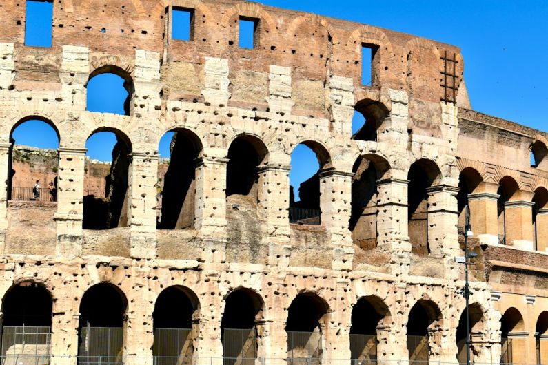 Restoring Ancient - brown concrete building during daytime