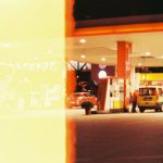 Autonomous Vehicles - Film Photograph of Cars at a Gas Station