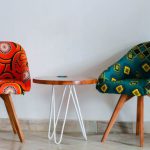 Furniture - Two Assorted-color Padded Chairs Near Side Table