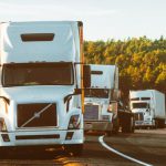 Transport - White Volvo Semi-truck on Side of Road